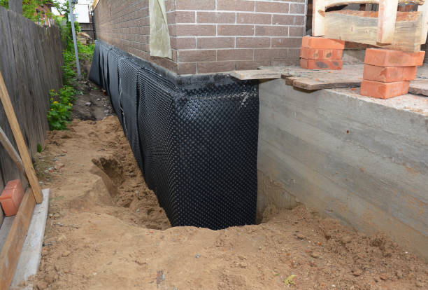 Happy homeowners after waterproofing job in Oakfield